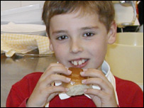 Charlie enjoys his St Edmund sticky bun