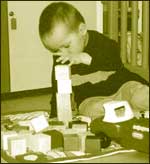 Baby with building blocks 
