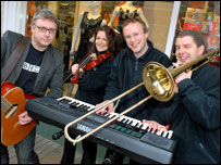 Pudsey's Buskers playing front of their adoring crowds in Devon for BBC Children in Need.