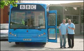 Paul and Ian pose beside the Blue bus outside the @Bristol museum